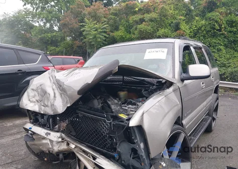 2001 Chevrolet Tahoe K1500 from USA, damaged, VIN 1GNEK13T11R179438